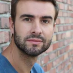 portrait young spanish man 80632520